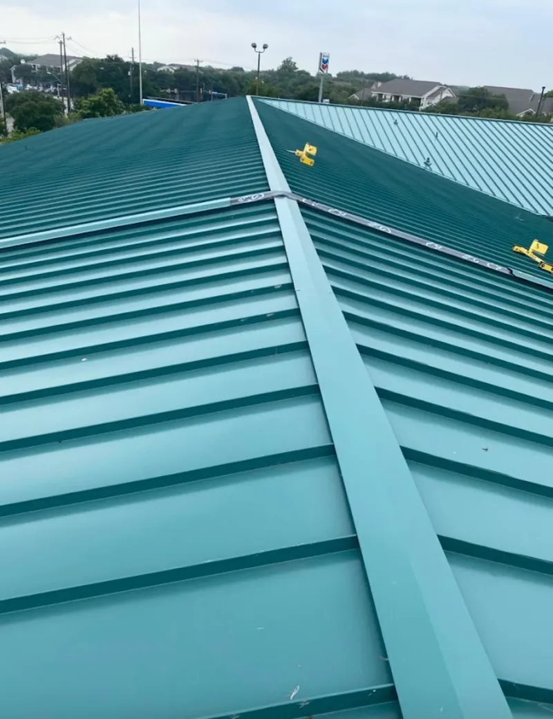 Green commercial metal roof ridge and valley for Metal Roof Repair in Culpeper